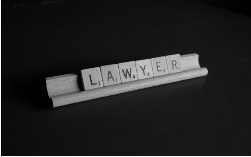 Lawyer written in Scrabble letters